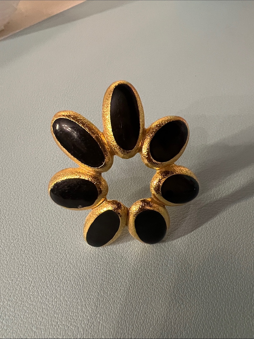 Anne Klein Gold-Tone Brooch with Black Oval Cabochons